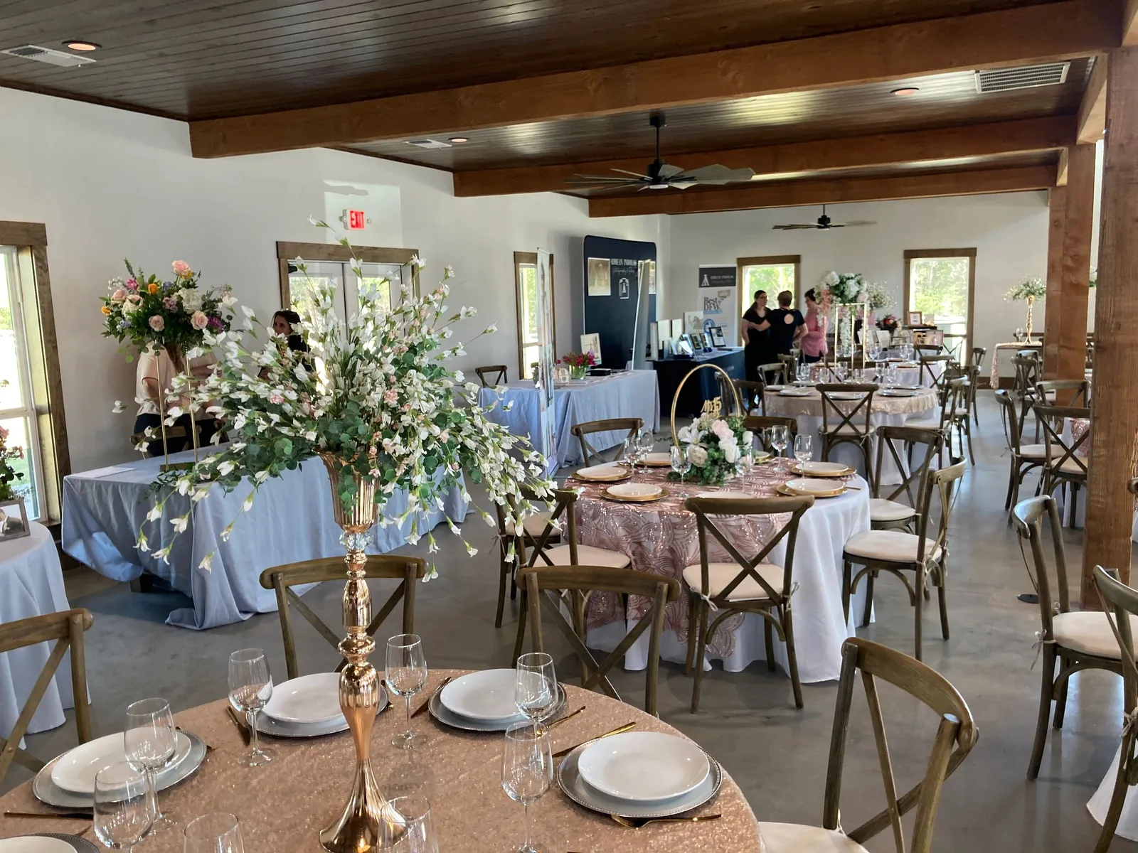 Crystal chandeliers over the wedding reception floor at Primrose Hill barn venue