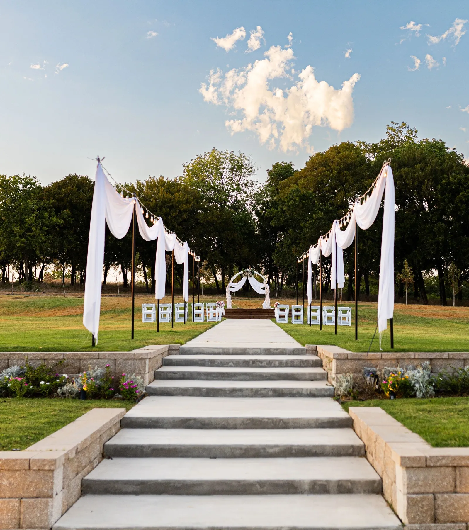 Outdoor wedding ceremony area with countryside views at Primrose Hill